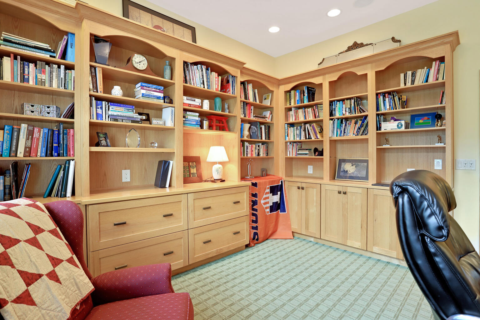 1011 West Charles Street Champaign, IL 61821 - Photo 16 of 51 a view of a workspace with bookshelf and a window
