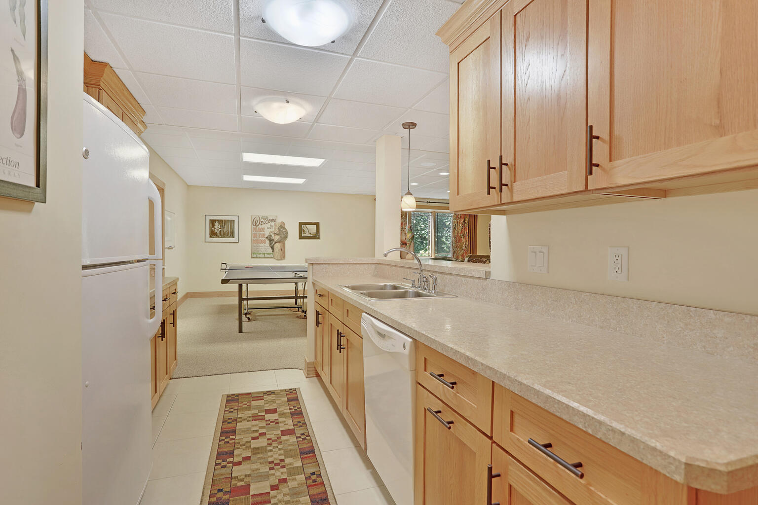 1011 West Charles Street Champaign, IL 61821 - Photo 38 of 51 a kitchen with cabinets and outdoor view