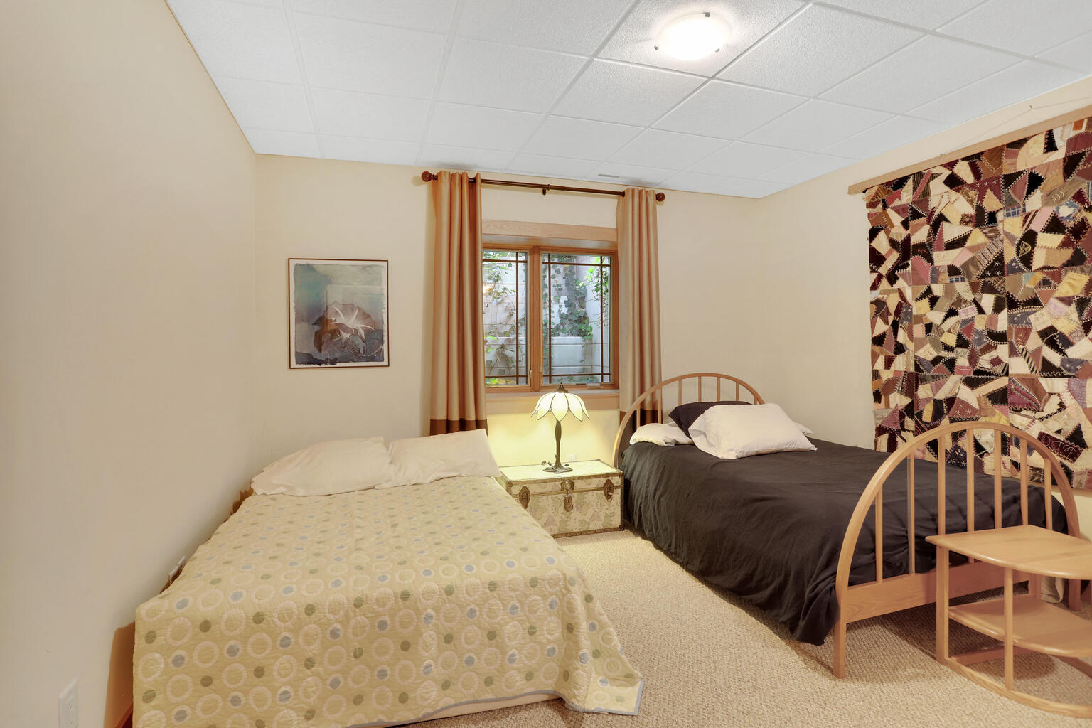1011 West Charles Street Champaign, IL 61821 - Photo 42 of 51 a bedroom with a bed and a painting on the wall