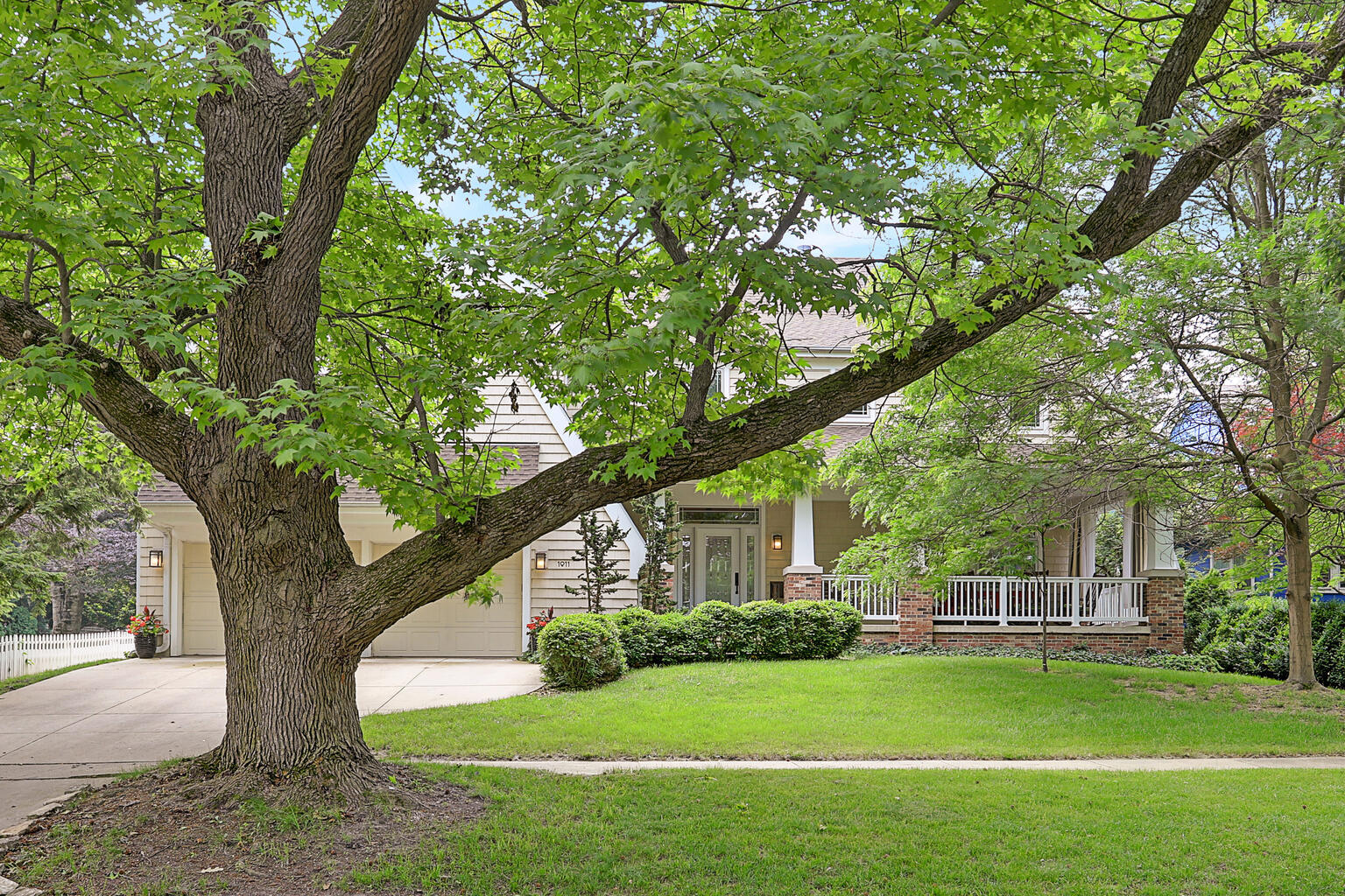 1011 West Charles Street Champaign, IL 61821 - Photo 49 of 51 a front view of a house with a yard and trees