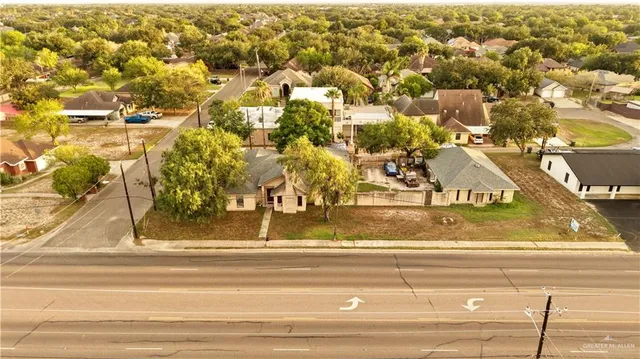 a view of a house with a street
