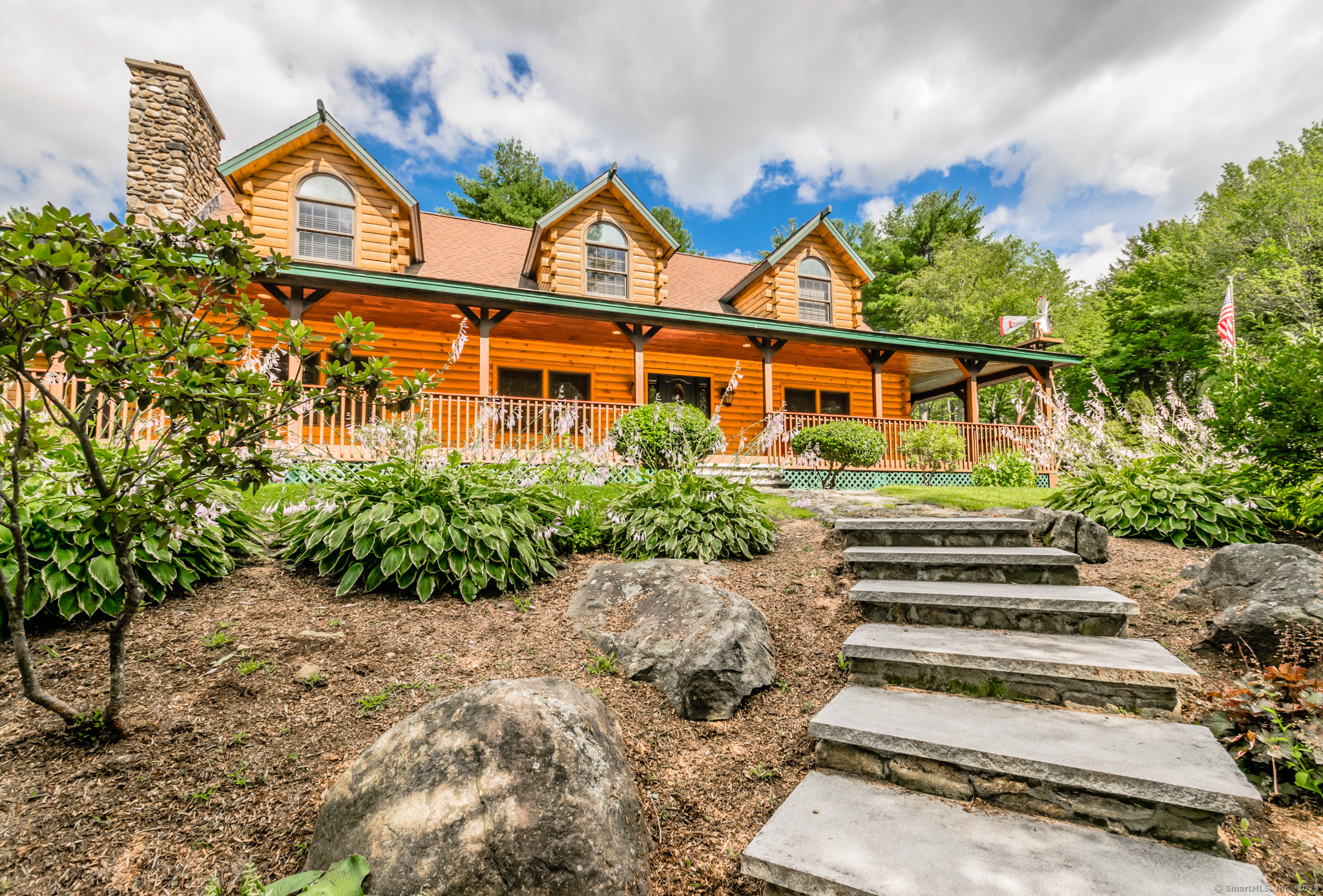 front view of a house with a yard