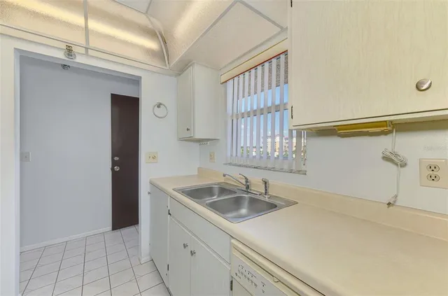 a view of a door and a window