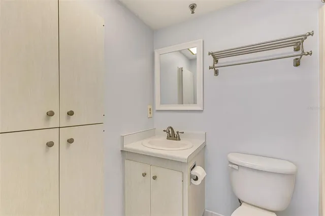 a bathroom with a shower and a toilet