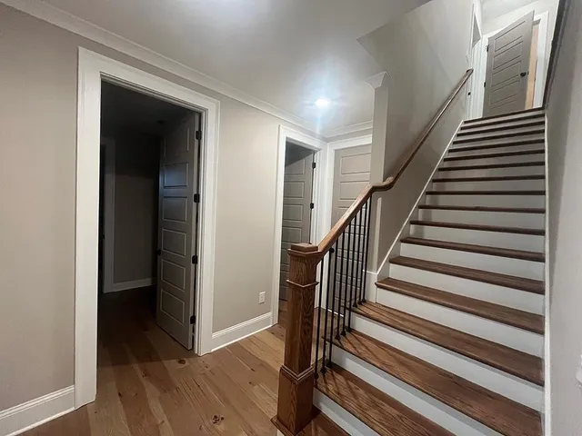 a view of entryway with wooden floor