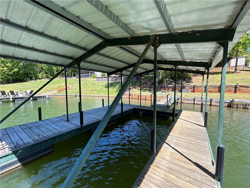 43 Sunset Cove Road Abbeville, SC 29620 - Photo 32 of 41 This private dock offers direct access to tranquil waters, perfect for leisure.