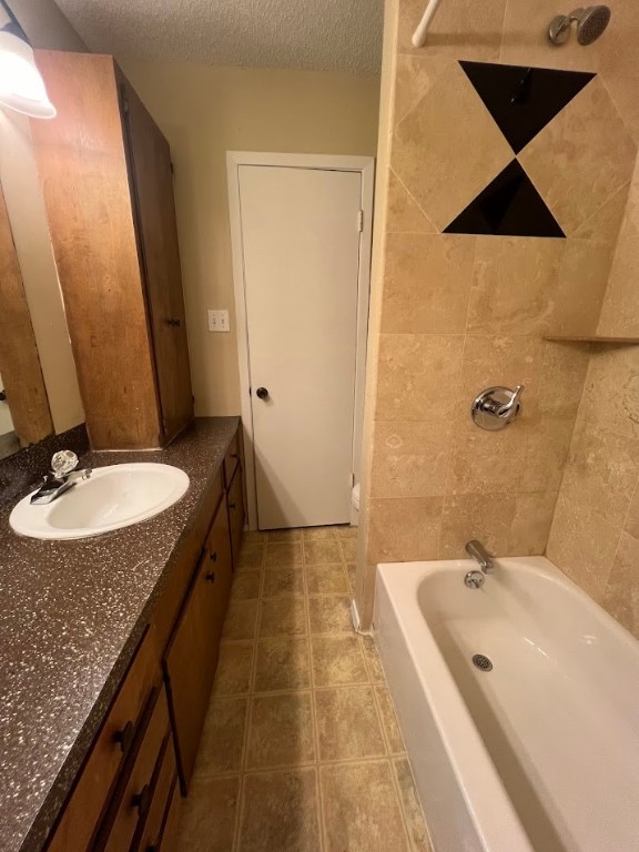 3000 South 1st Street, Unit 104 Austin, TX 78704 - Photo 24 of 31 a bathroom with a granite countertop sink and a mirror