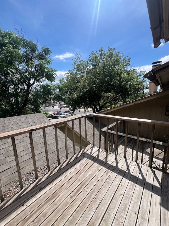 3000 South 1st Street, Unit 104 Austin, TX 78704 - Photo 29 of 31 a view of balcony with wooden floor and seating space