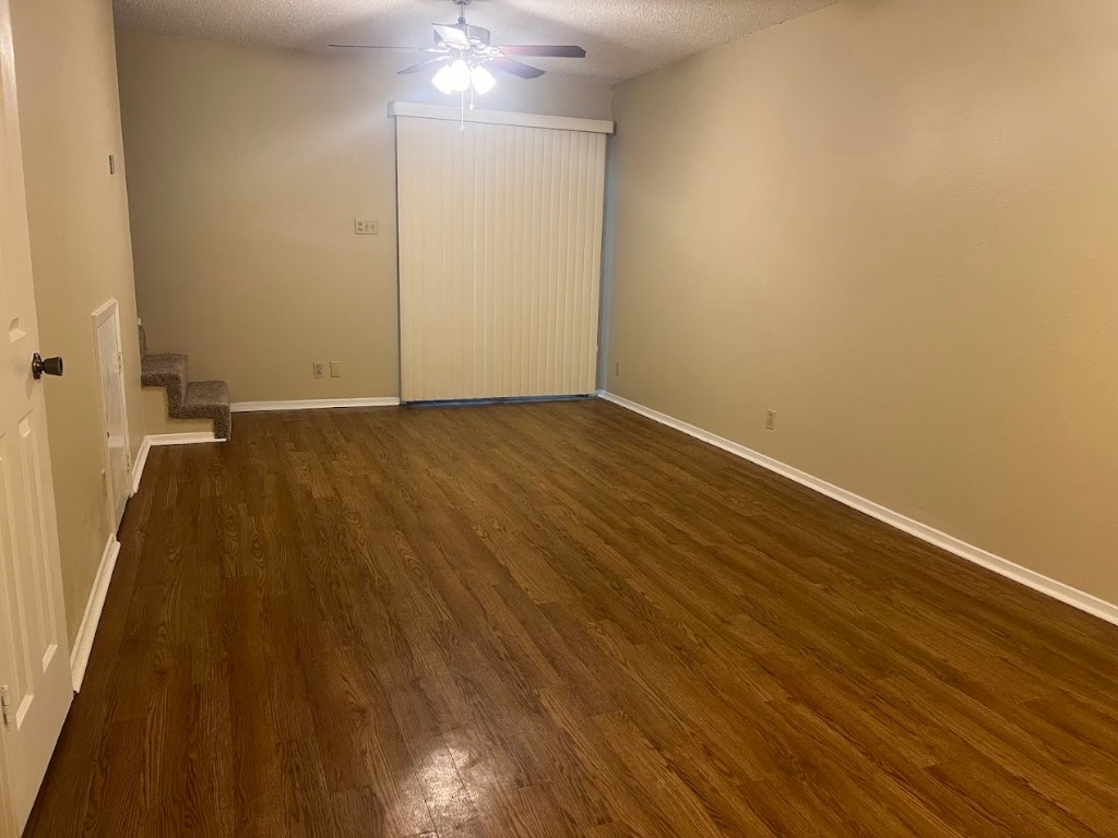 3000 South 1st Street, Unit 104 Austin, TX 78704 - Photo 3 of 31 wooden floor in an empty room