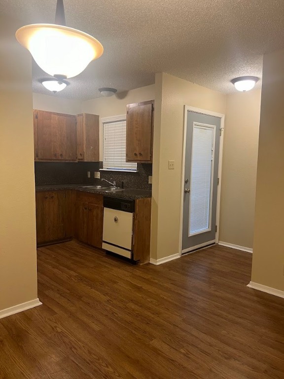 3000 South 1st Street, Unit 104 Austin, TX 78704 - Photo 6 of 31 a kitchen with stainless steel appliances granite countertop a refrigerator and a sink
