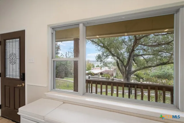 a view of a porch with a large window