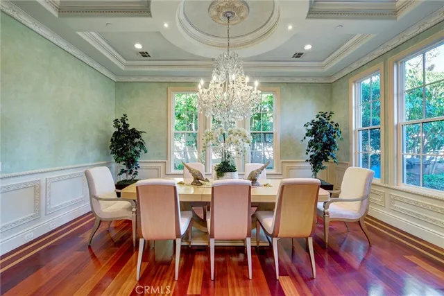 a kitchen with wooden cabinets and a stove top oven