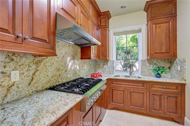 a utility room with sink dryer and washer
