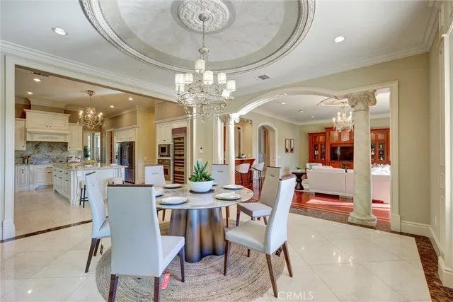 a bedroom with furniture and a rug