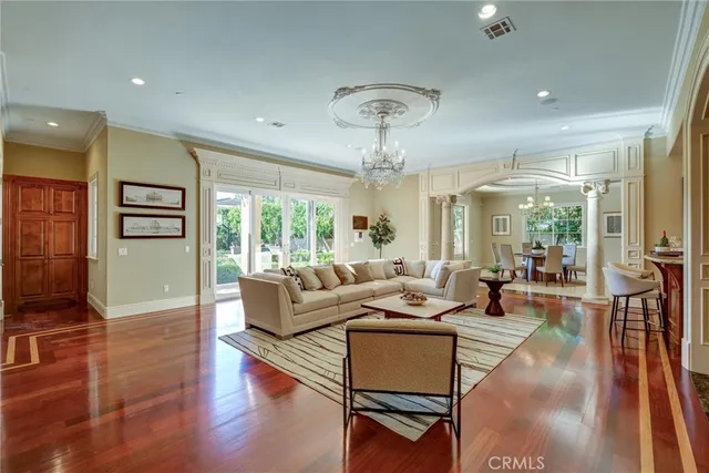 a bathroom with a granite countertop toilet a sink and a mirror