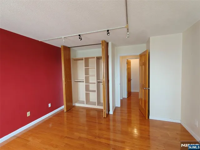 a view of a livingroom with wooden floor