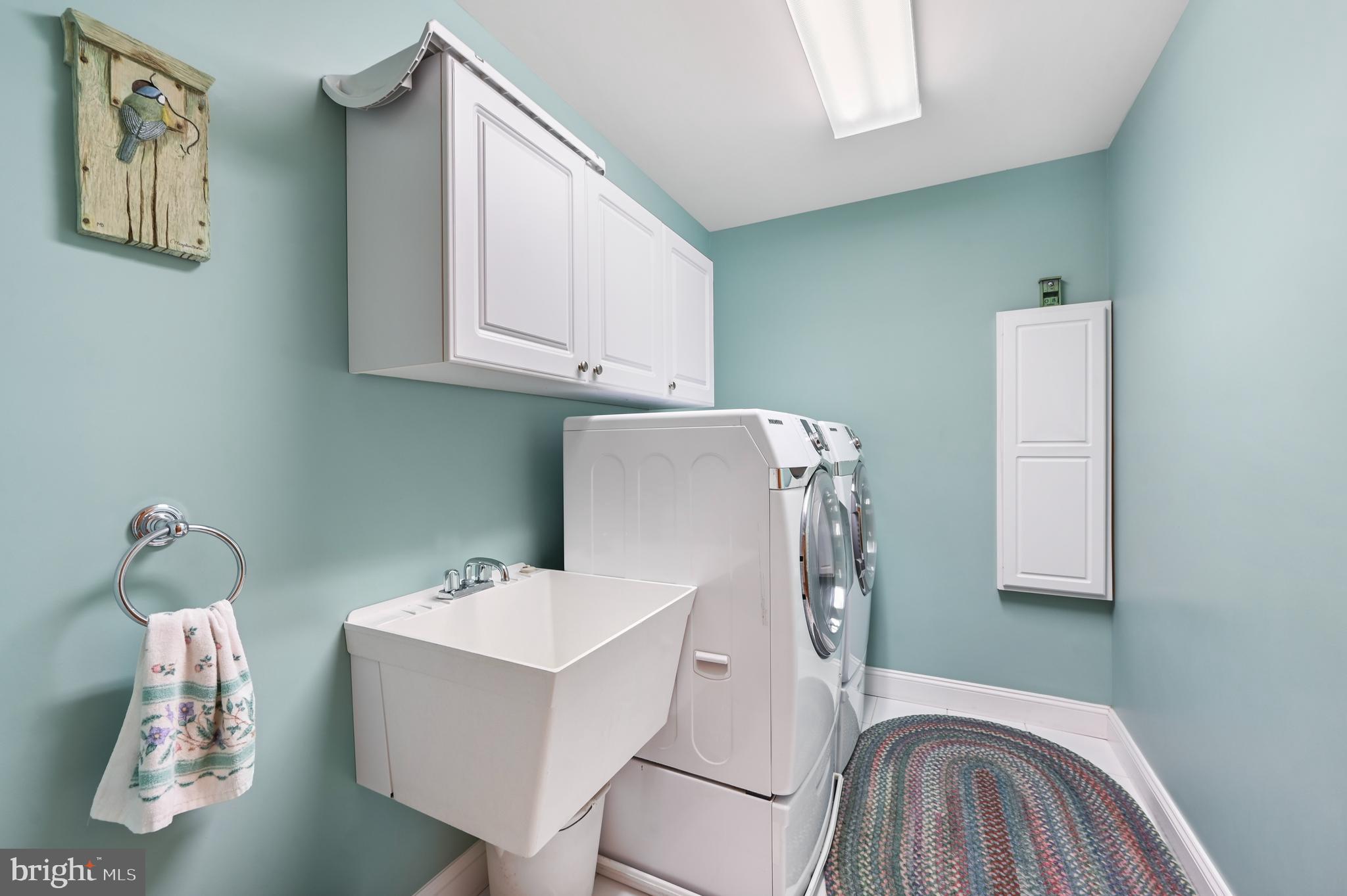 1495 Midstate Road Felton, DE 19943 - Photo 13 of 25 a bathroom with a sink mirror and vanity