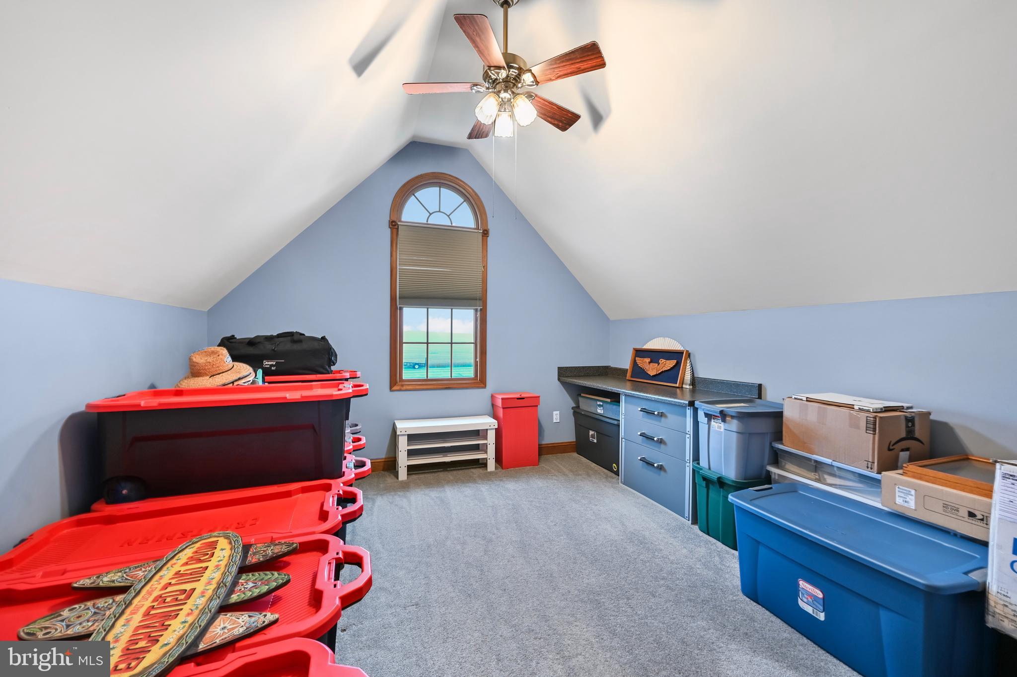 1495 Midstate Road Felton, DE 19943 - Photo 21 of 25 a bedroom with a bed and a chandelier