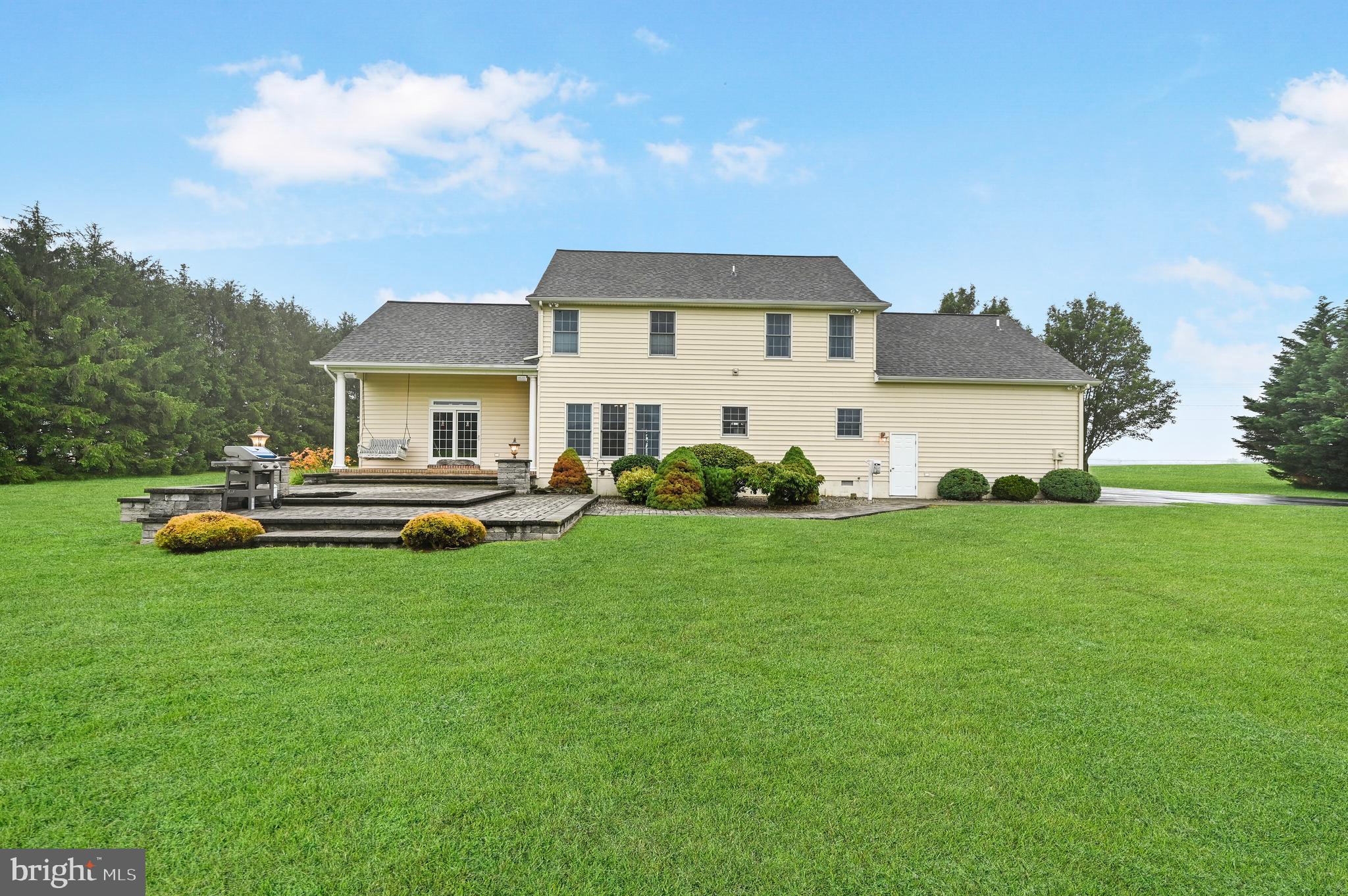 1495 Midstate Road Felton, DE 19943 - Photo 24 of 25 a front view of a house with garden