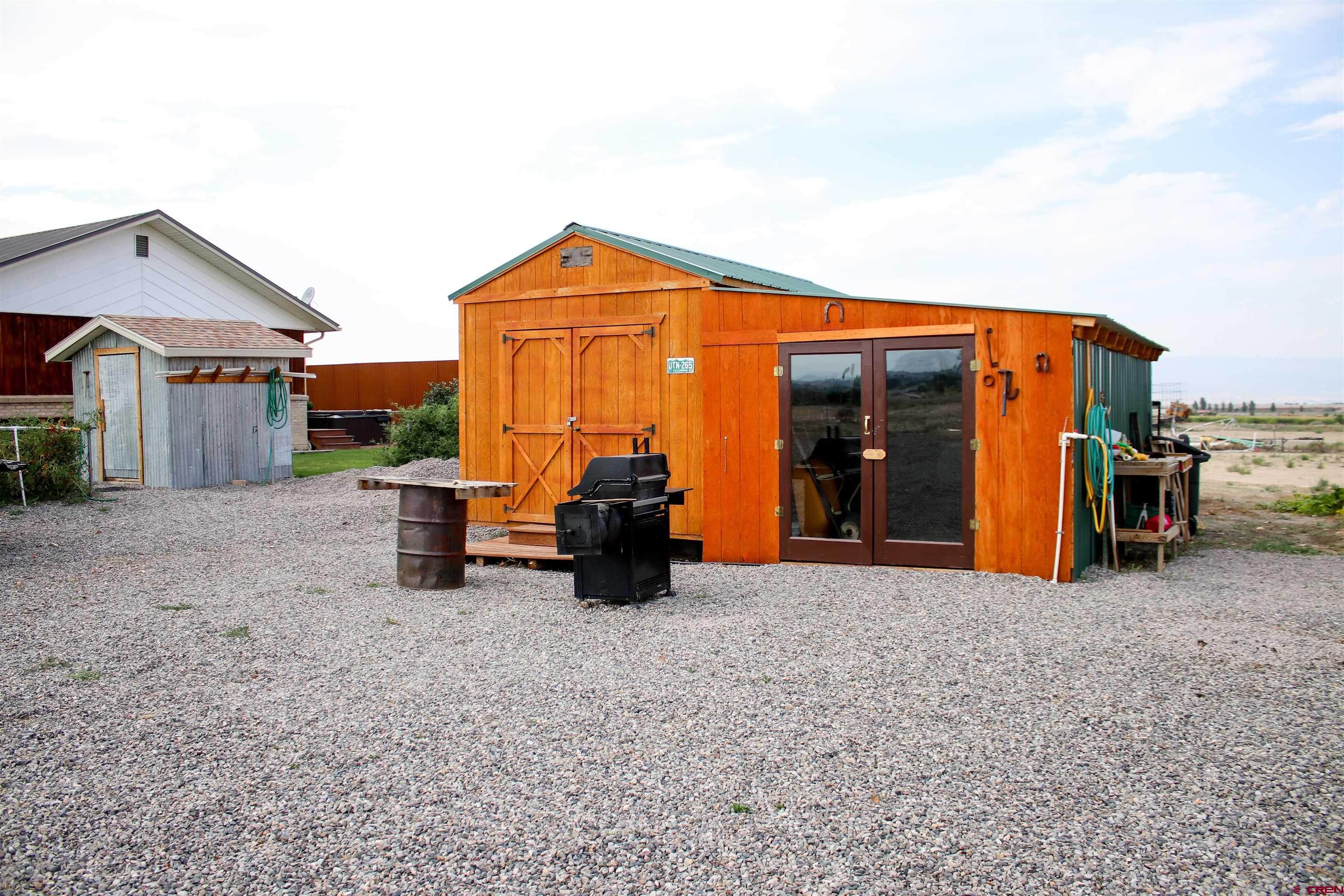 58811 Banner Road Olathe, CO 81425 - Photo 31 of 35 a view of a house with basketball court