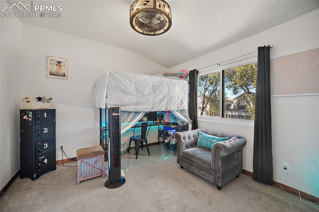 7015 Reunion Circle Fountain, CO 80817 - Photo 22 of 41 a living room with furniture and a window