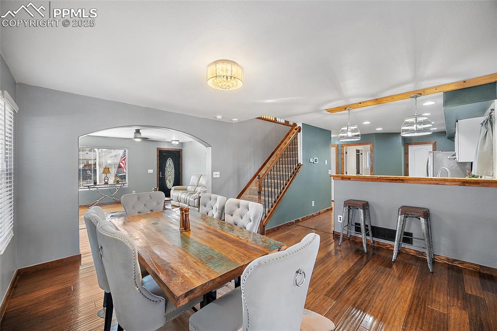 7015 Reunion Circle Fountain, CO 80817 - Photo 23 of 41 a living room with furniture and a wooden floor