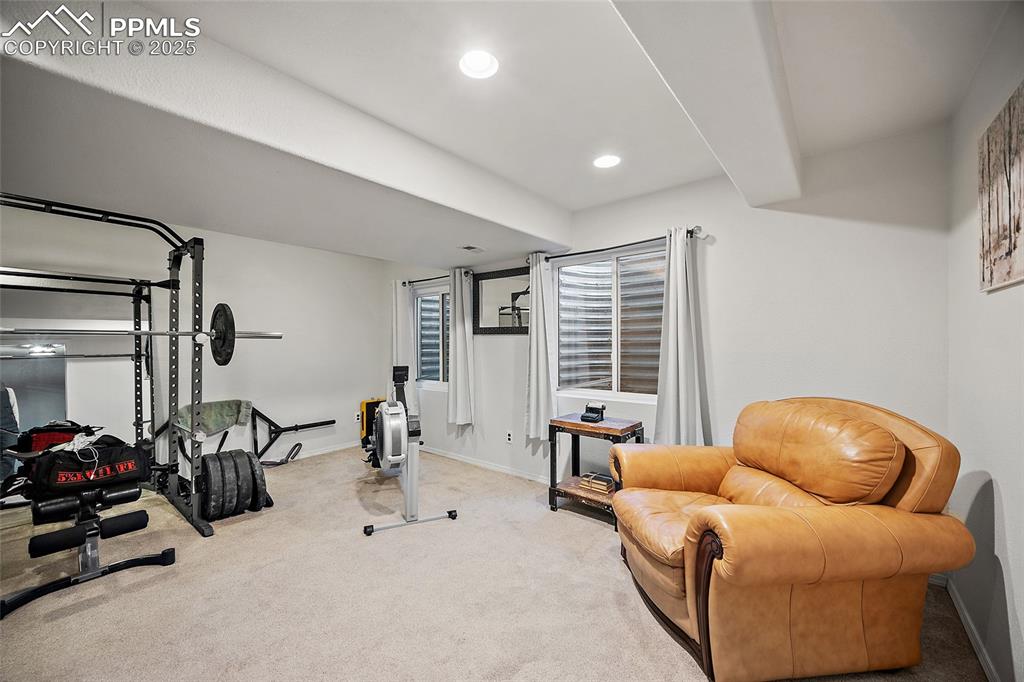 7015 Reunion Circle Fountain, CO 80817 - Photo 28 of 41 a livingroom with furniture and a large window