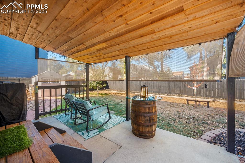 7015 Reunion Circle Fountain, CO 80817 - Photo 30 of 41 a living room with large windows