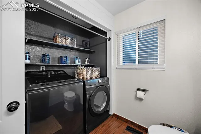 a kitchen with a stove and a refrigerator