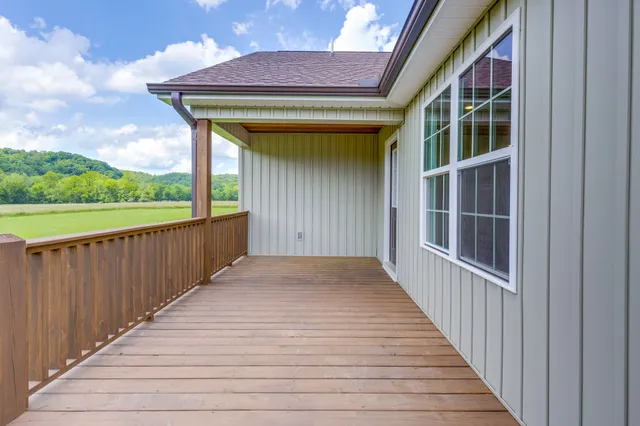 a view of a lake with a yard