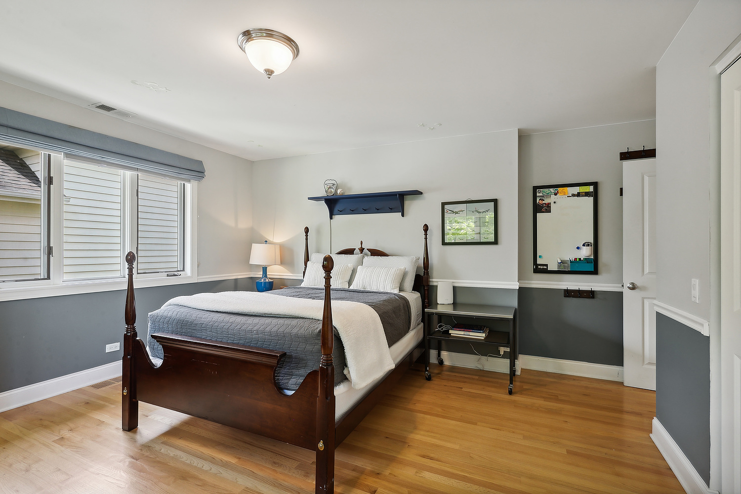 2432 Illinois Road Northbrook, IL 60062 - Photo 14 of 22 a bed room with a bed and a window