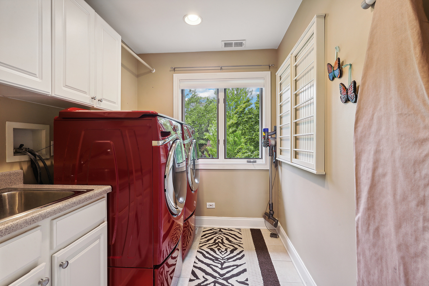 2432 Illinois Road Northbrook, IL 60062 - Photo 15 of 22 a kitchen with a refrigerator and a sink