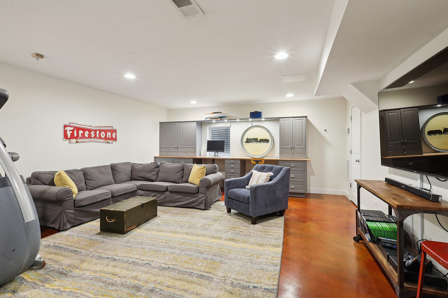 2432 Illinois Road Northbrook, IL 60062 - Photo 19 of 22 a living room with furniture and a flat screen tv