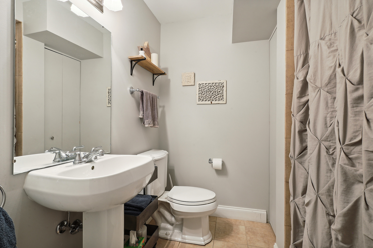 2432 Illinois Road Northbrook, IL 60062 - Photo 20 of 22 a bathroom with a sink and toilet