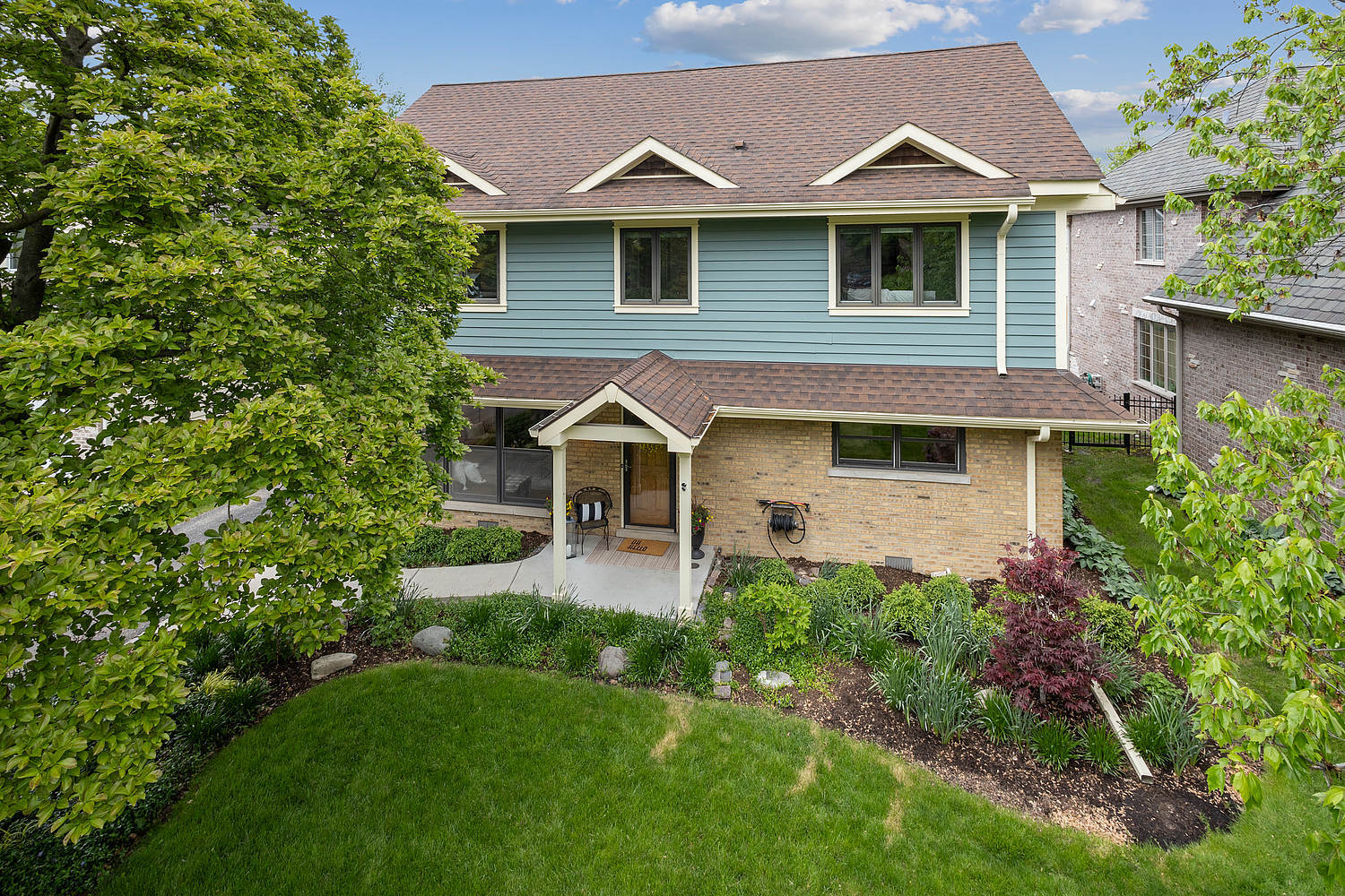2432 Illinois Road Northbrook, IL 60062 - Photo 22 of 22 a front view of a house with a yard