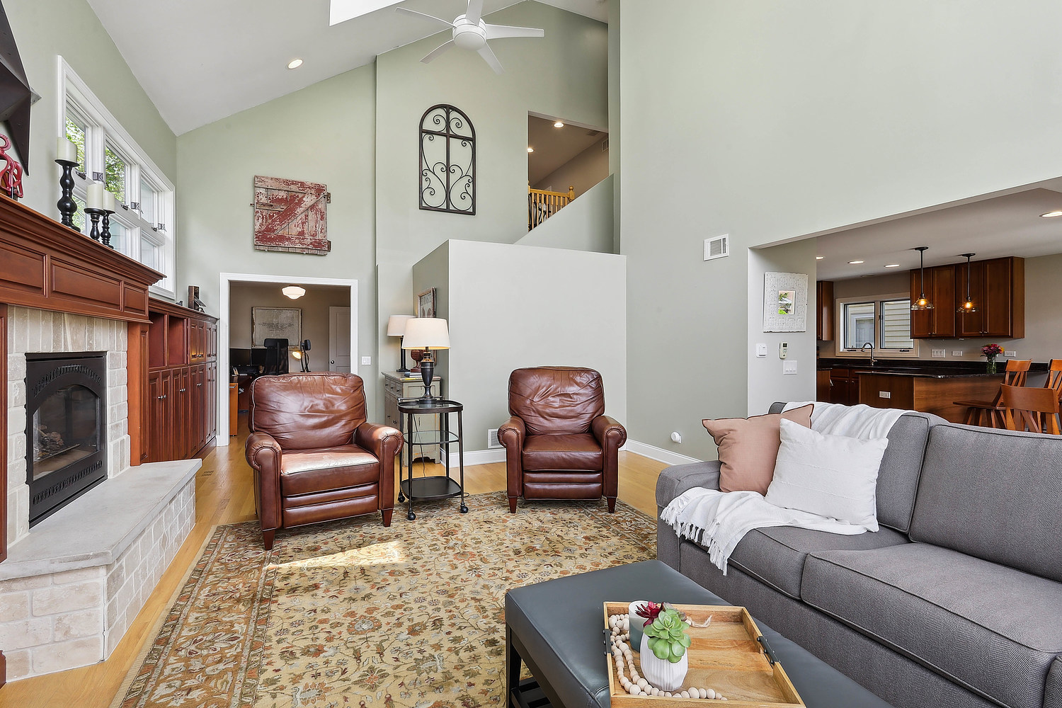 2432 Illinois Road Northbrook, IL 60062 - Photo 5 of 22 a living room with furniture and a fireplace