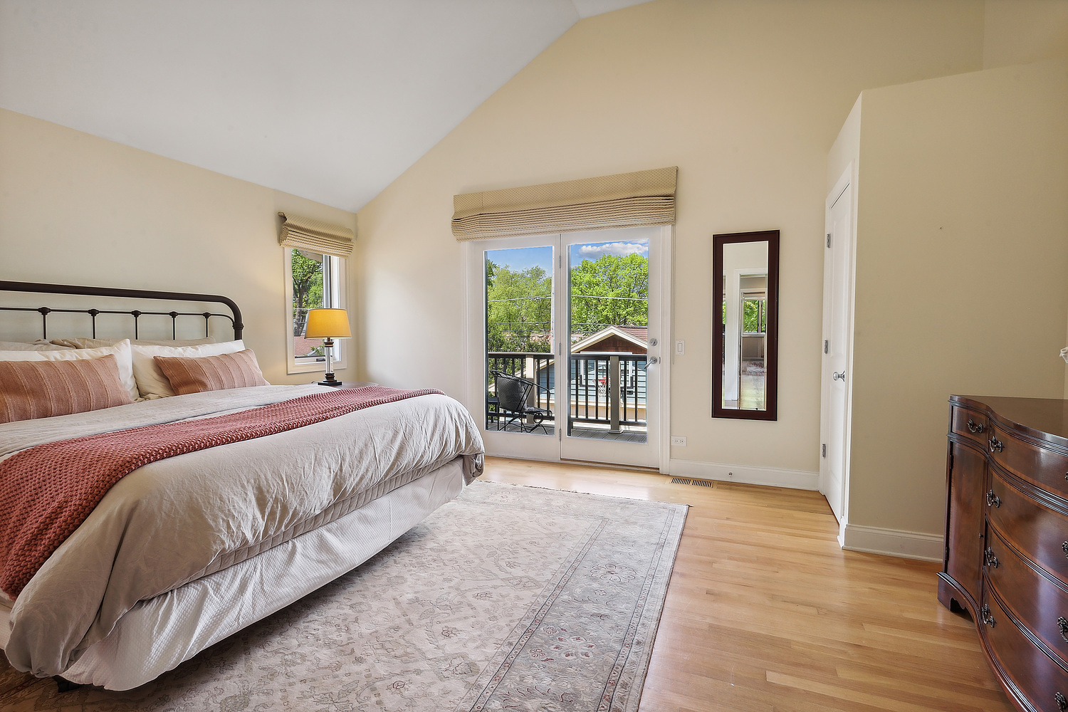 2432 Illinois Road Northbrook, IL 60062 - Photo 9 of 22 a spacious bedroom with a bed and a large window