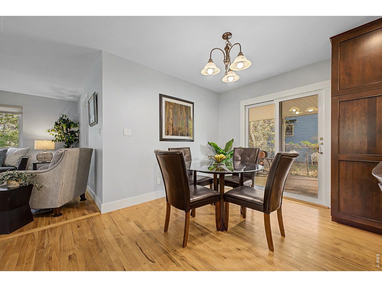1453 Chestnut Place Boulder, CO 80304 - Photo 12 of 32 a view of a dining room with furniture and wooden floor