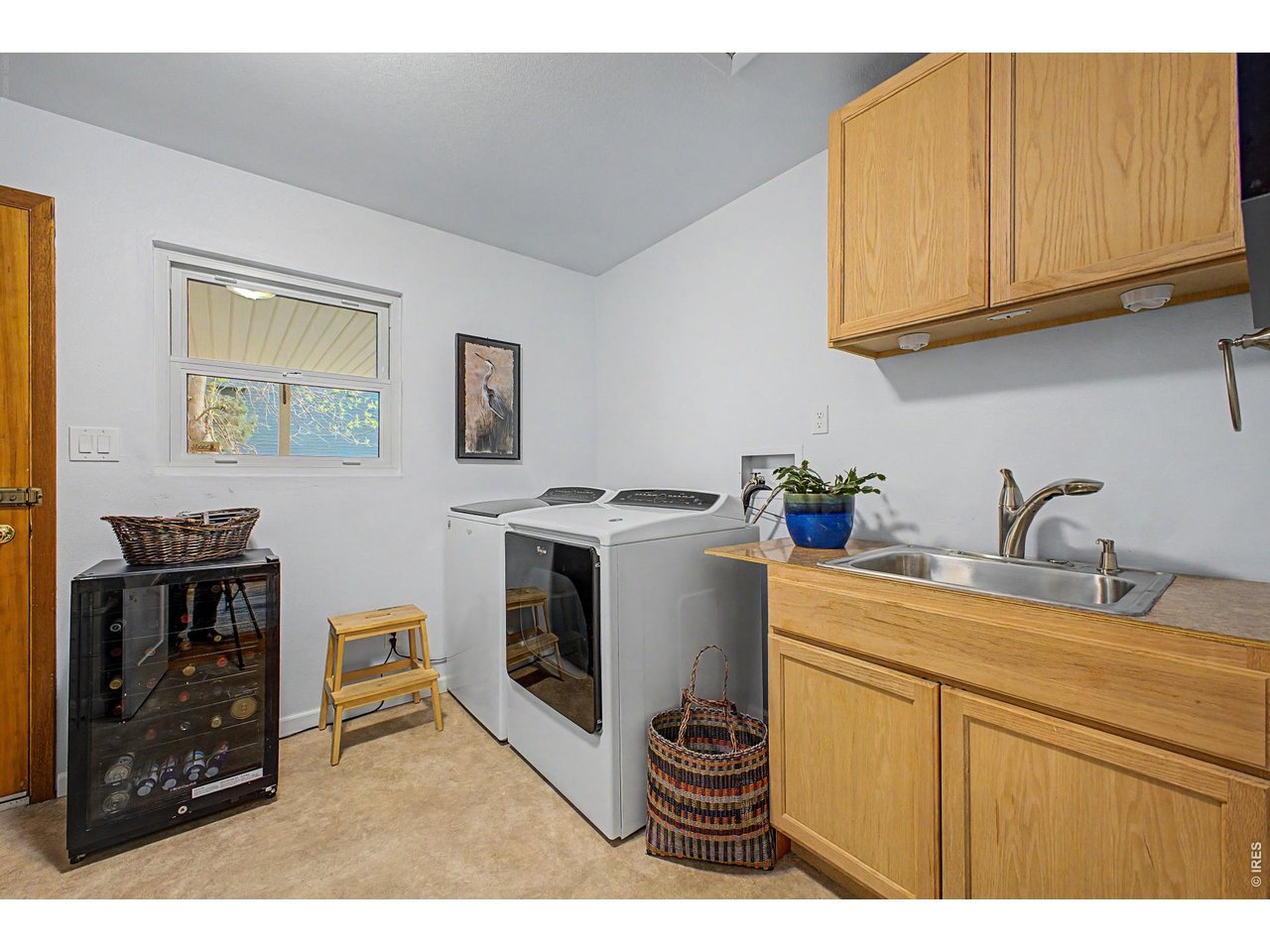 1453 Chestnut Place Boulder, CO 80304 - Photo 21 of 32 a kitchen with sink cabinets and appliances