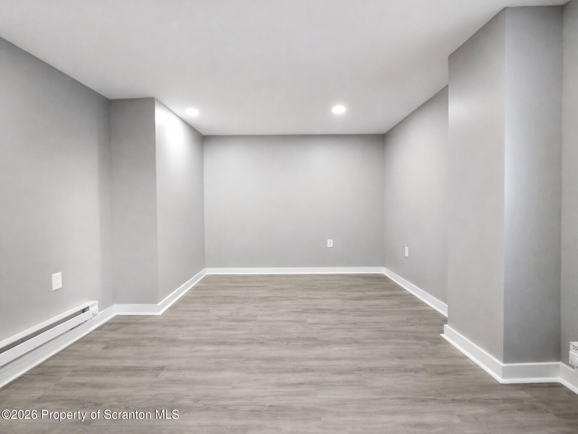 1215 Eynon Street Scranton, PA 18504 - Photo 13 of 23 a view of room and wooden floor