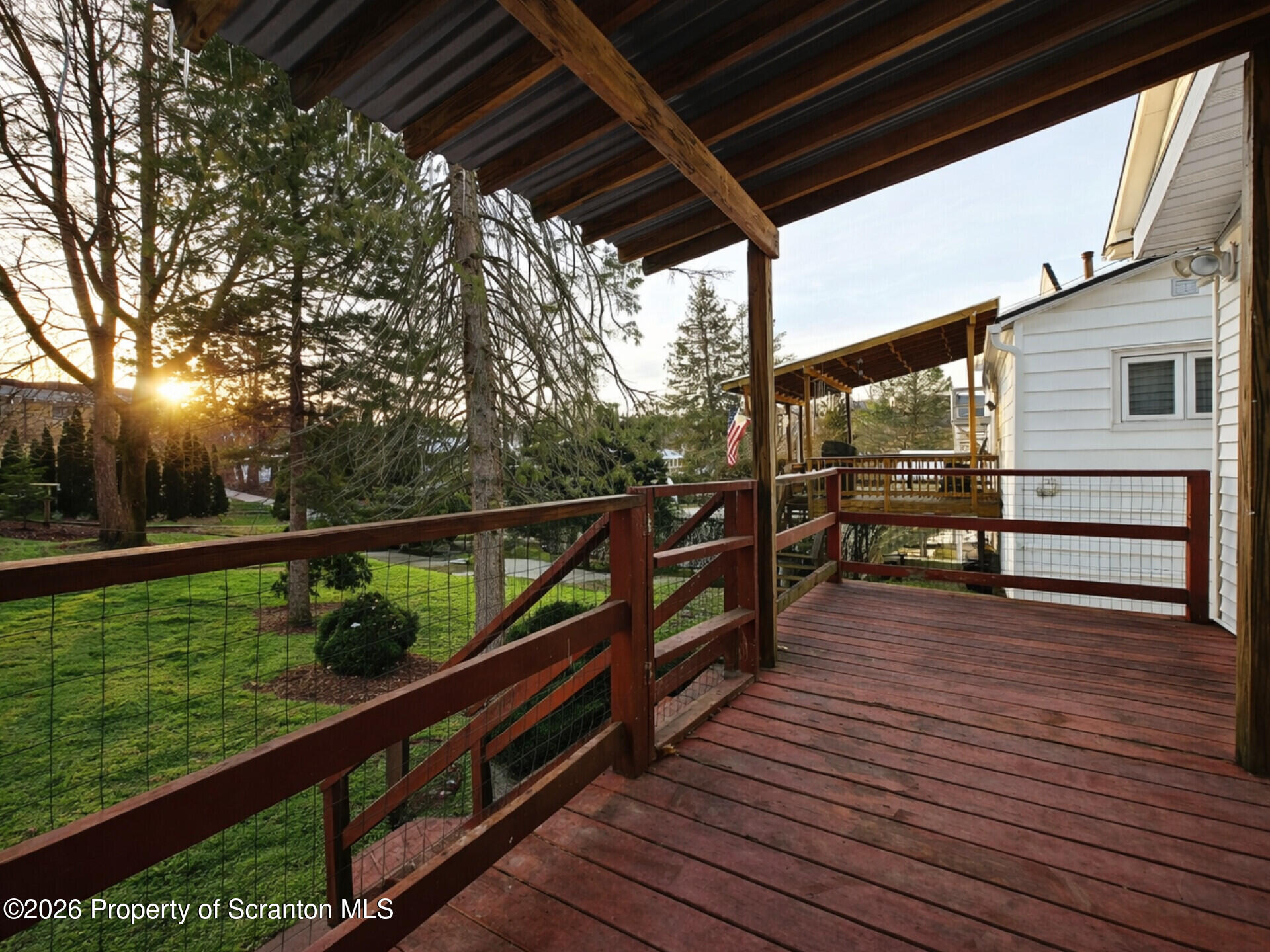 1215 Eynon Street Scranton, PA 18504 - Photo 23 of 23 a view of a deck in front of house with wooden floor