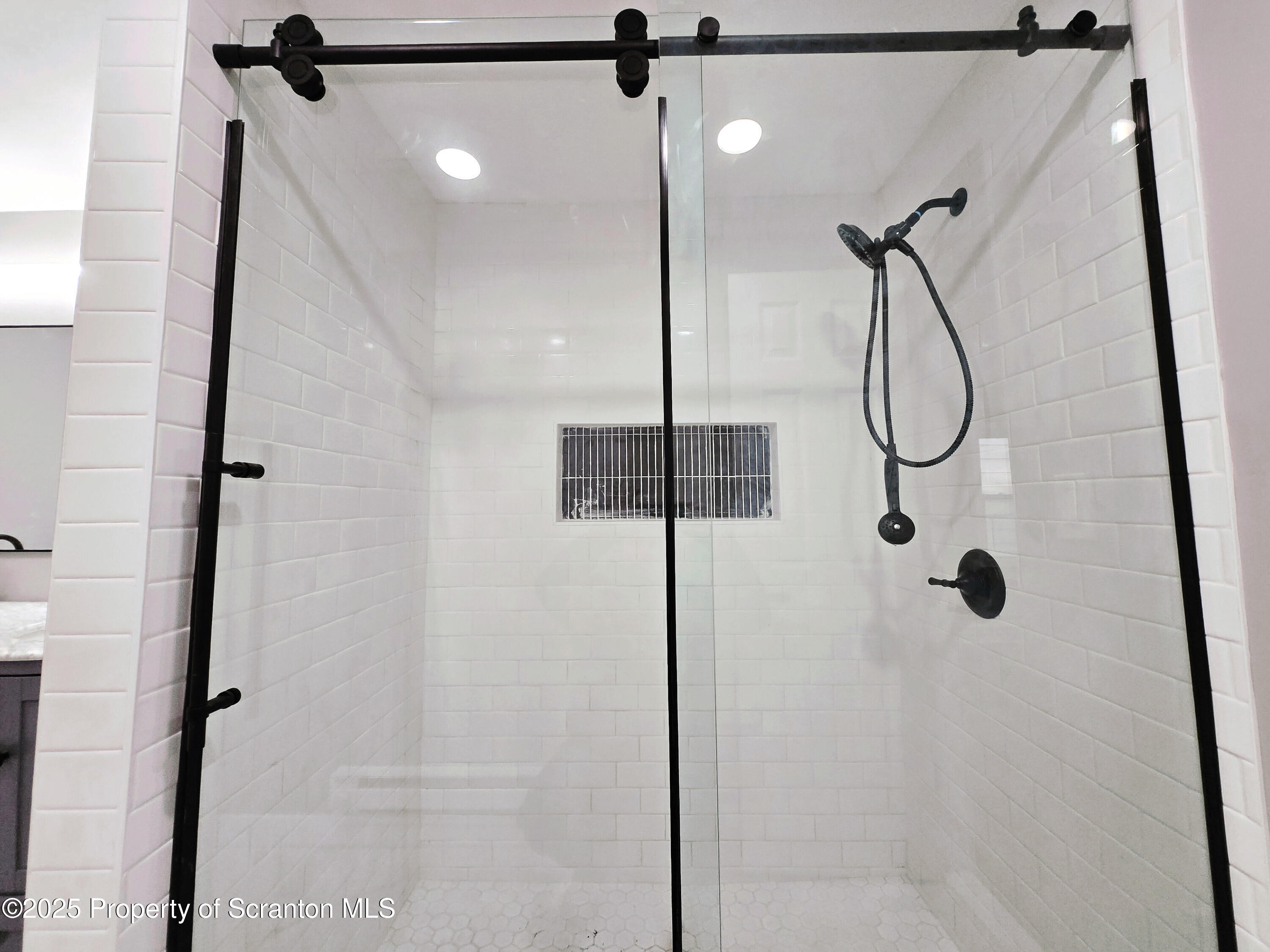 1215 Eynon Street Scranton, PA 18504 - Photo 9 of 23 a bathroom with a shower