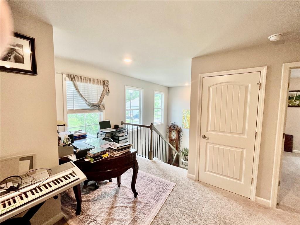 3015 Winding Ridge Waleska, GA 30183 - Photo 21 of 40 a living room with furniture a piano and a window