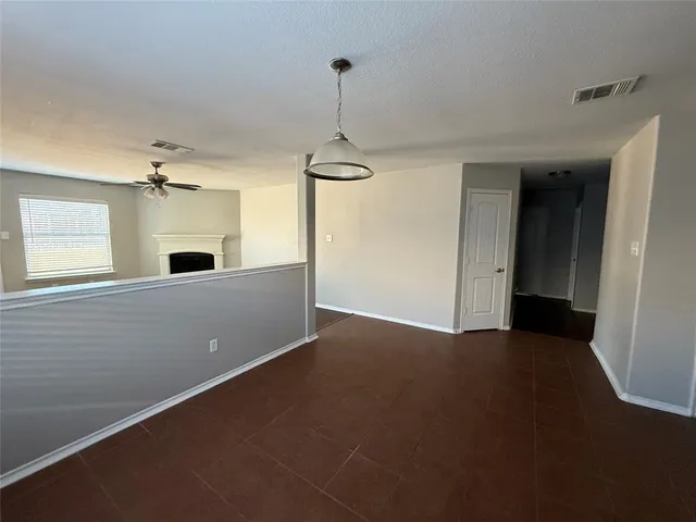 a view of a windows and chandelier in a room