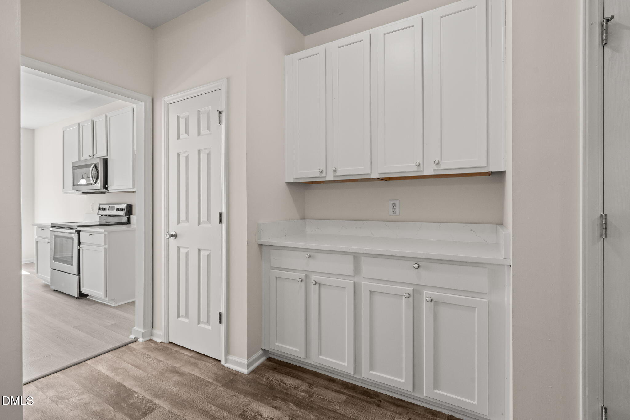 3207 Geary Trail Raleigh, NC 27610 - Photo 11 of 55 a view of kitchen with white cabinets