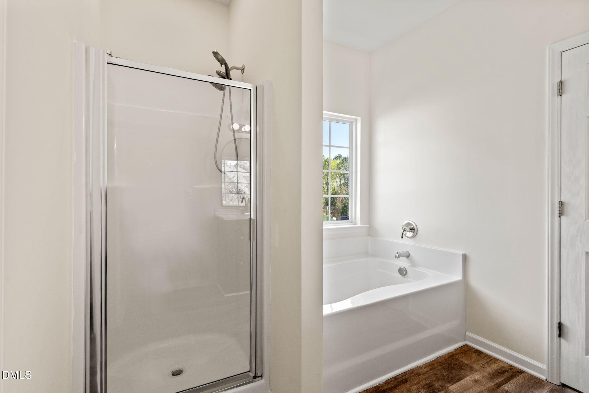 3207 Geary Trail Raleigh, NC 27610 - Photo 23 of 55 a bathroom with a bathtub and a sink