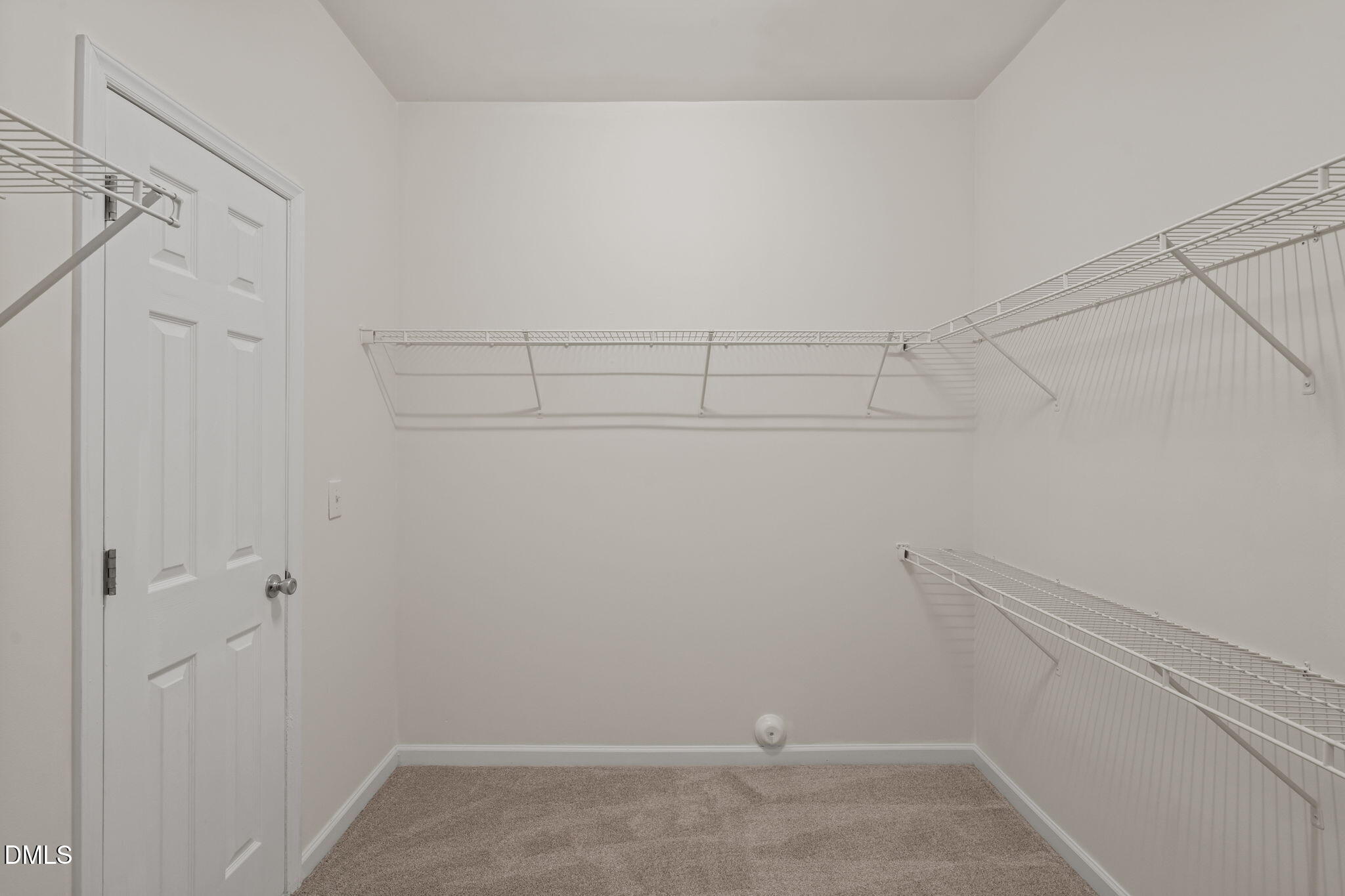 3207 Geary Trail Raleigh, NC 27610 - Photo 24 of 55 a view of a room with racks on the wall
