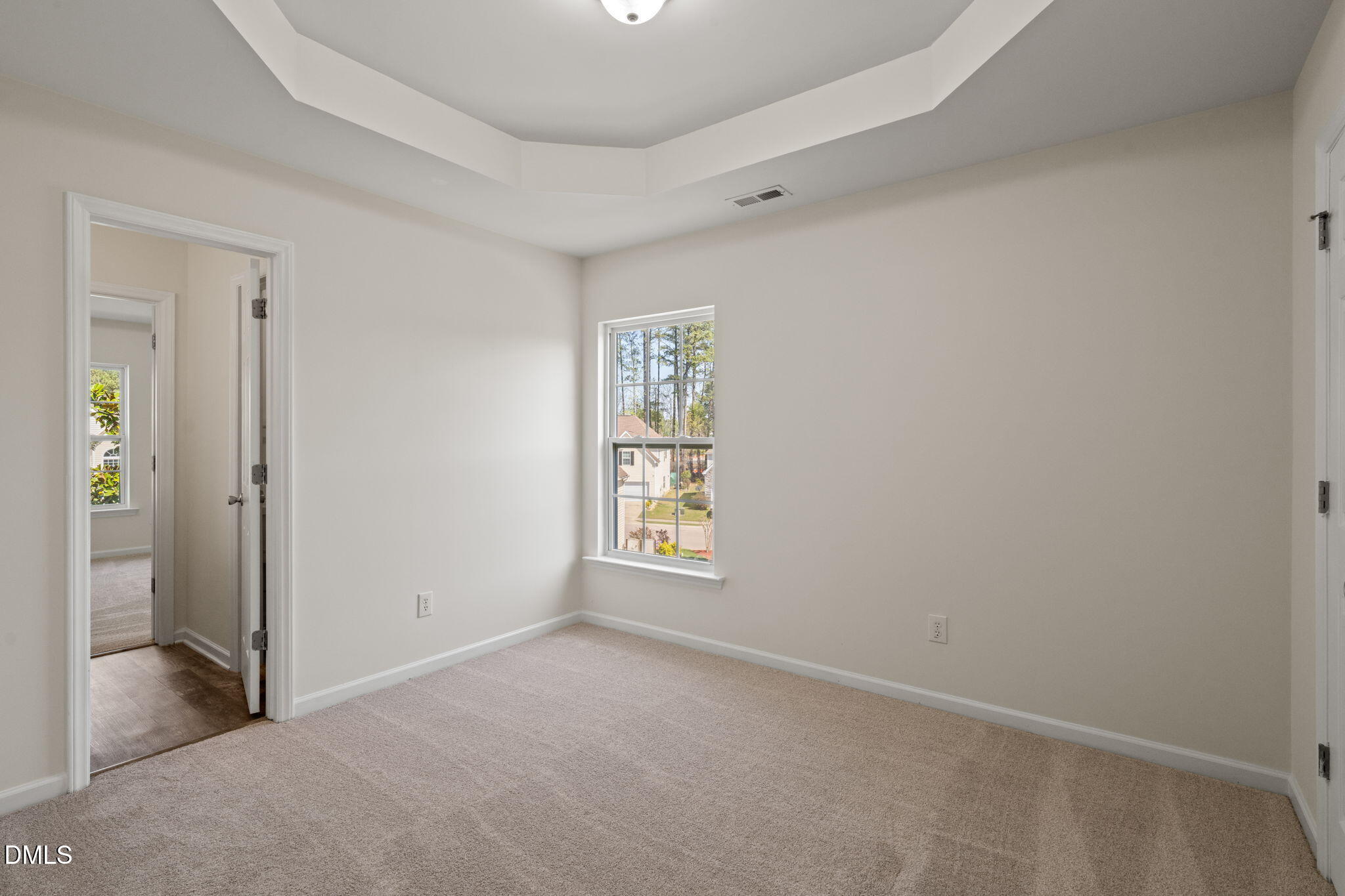3207 Geary Trail Raleigh, NC 27610 - Photo 27 of 55 an empty room with windows and closet
