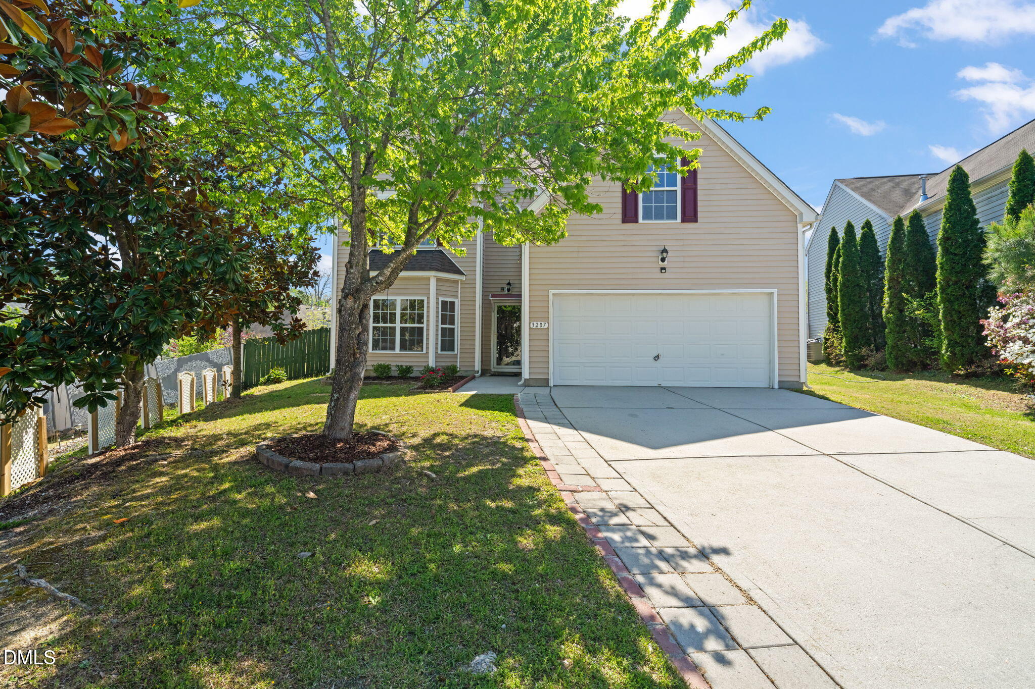 3207 Geary Trail Raleigh, NC 27610 - Photo 2 of 55 a house view with a garden space