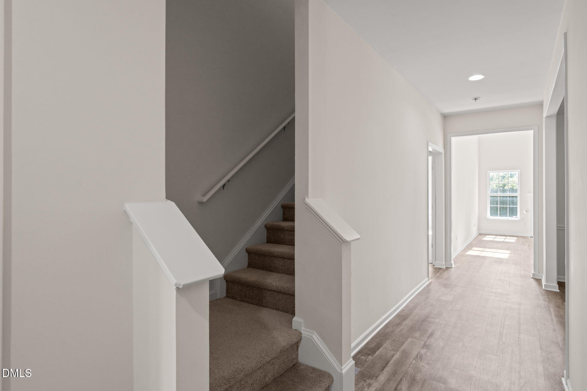 3207 Geary Trail Raleigh, NC 27610 - Photo 7 of 55 a view of a hallway with staircase